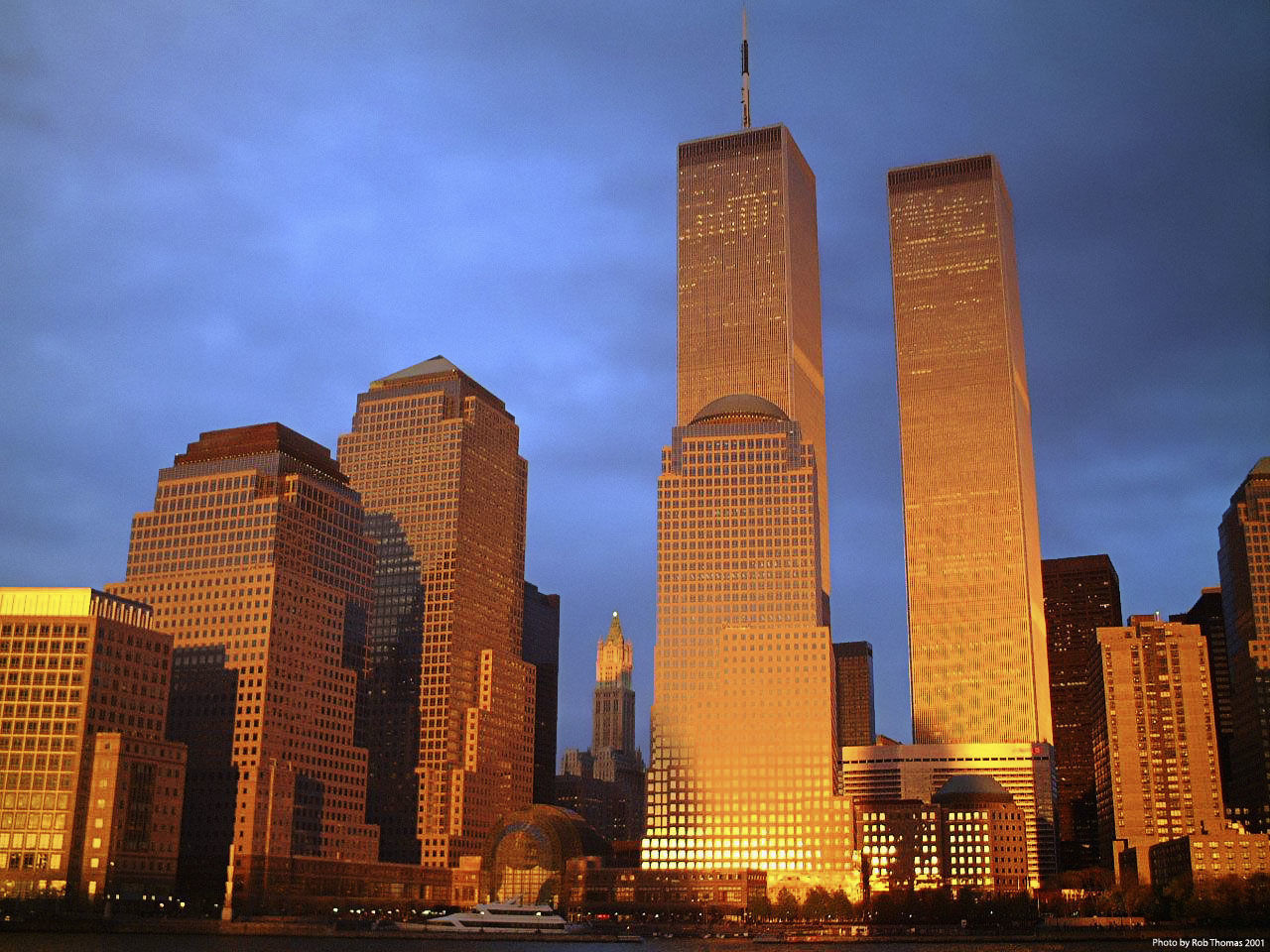 LOW ANGLE VIEW OF MODERN SKYSCRAPERS AGAINST SKY