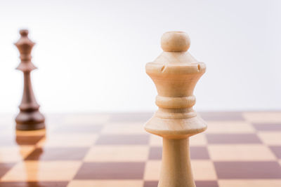 Close-up of chess against white background