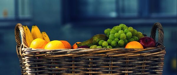 Panoramic shot of fruits in wicket basket