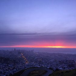 Aerial view of cityscape at sunset