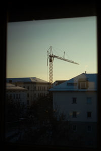 Crane against sky