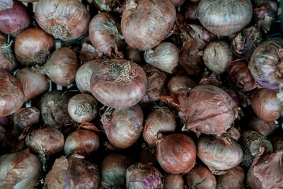 Full frame shot of onions for sale at market