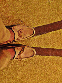 Low section of man standing outdoors