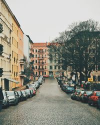 Parked cars parked in front of building