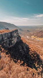 Scenic view of rock formations against sky