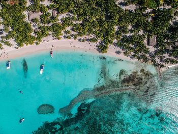 High angle view of people by sea