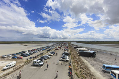 Cars on road against sky