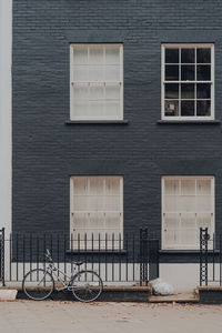 Bike parked in front of a house on a street in clerkenwell, london, uk.