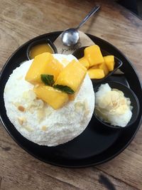 Close-up of fruits in plate on table