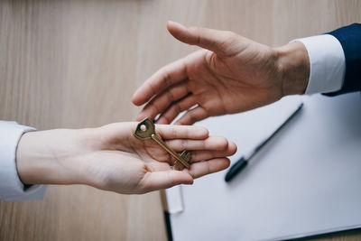 Close-up of hand holding hands