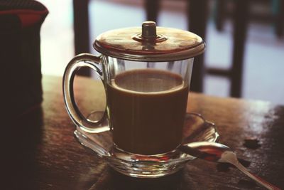 Close-up of coffee cup on table