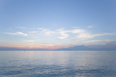 Scenic view of sea against sky at sunset