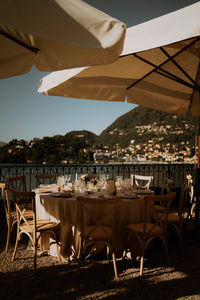 Empty chairs and tables in restaurant