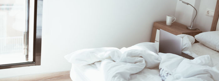 White curtain on bed at home