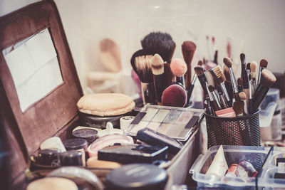 High angle view of make-up tool on table