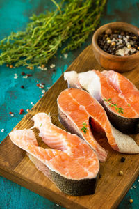 High angle view of fruits on cutting board