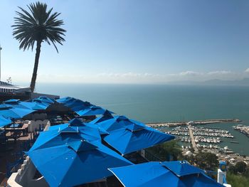 Scenic view of sea against blue sky