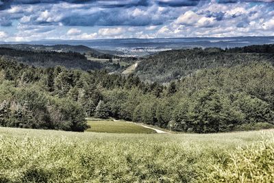 Scenic view of land against sky