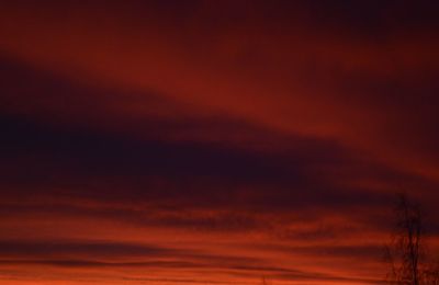 Low angle view of dramatic sky during sunset