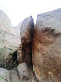 Close-up of rocks against clear sky