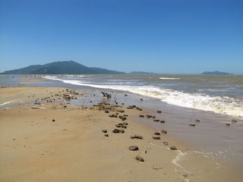 Scenic view of beach against sky