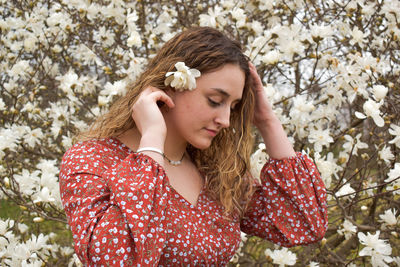 Portrait of young woman looking away