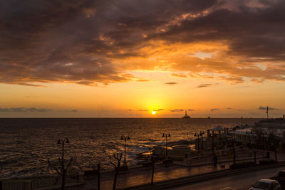 Scenic view of sea at sunset