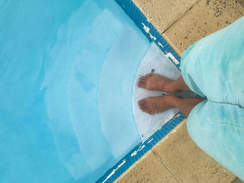 High angle view of woman swimming in pool