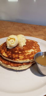 Close-up of breakfast served on table