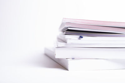 Close-up of books on white background