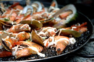 Close-up of seafood paella in cooking pan