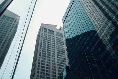 Low angle view of skyscrapers against sky