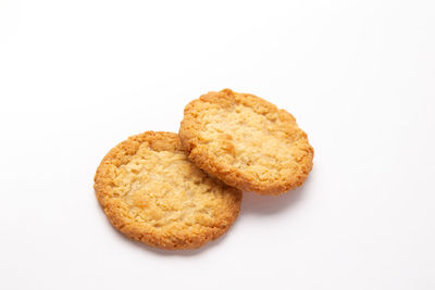 Close-up of cookies against white background