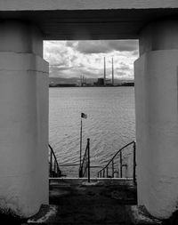 Bridge over sea against sky