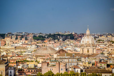 View of cityscape against clear sky