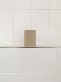 Close-up of white tiled wall