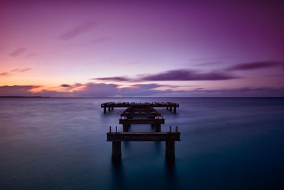 Scenic view of sea against sky at sunset