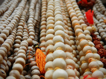 Full frame shot of prayer beads at market stall