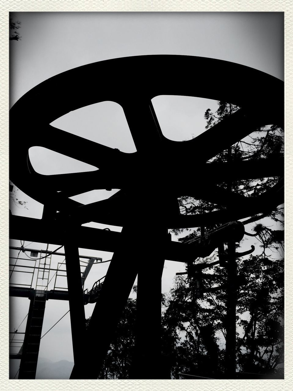 transfer print, auto post production filter, low angle view, indoors, metal, sky, built structure, pattern, close-up, silhouette, day, no people, architecture, metallic, protection, arch, clear sky, circle, design