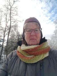 Portrait of man wearing eyeglasses during winter