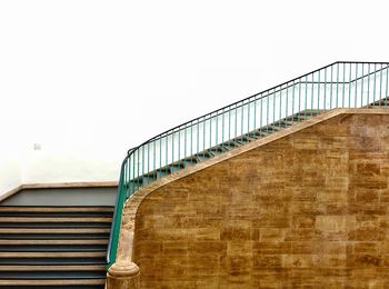 Low angle view of staircase against clear sky