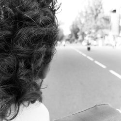 Close-up of woman on road