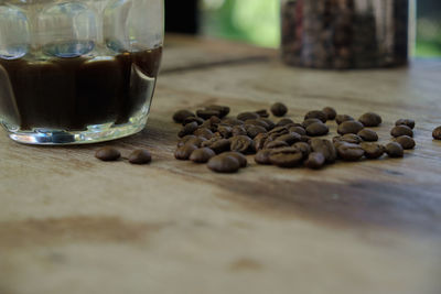 Close-up of coffee beans on table