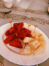 High angle view of orange slices in plate on table