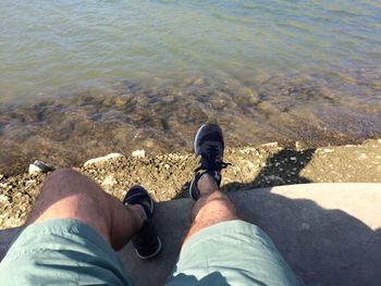 People relaxing on shore