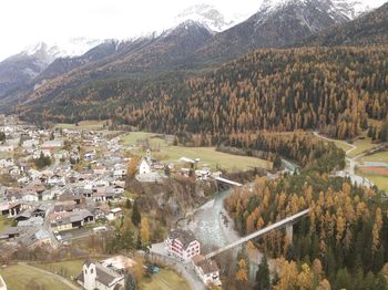 High angle view of townscape and mountains