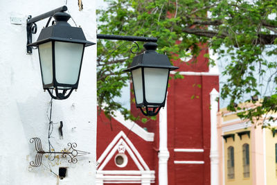 Close-up of street lights mounted on wall