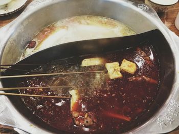 Close-up of meat in cooking pan