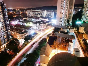 High angle view of illuminated city at night