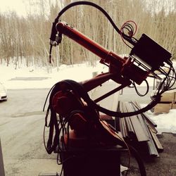 Bicycle parked on snow covered street